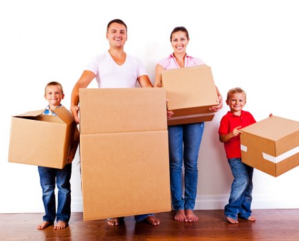 Packed boxes and furniture ready for local removals in Northolt