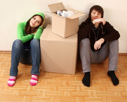 Unpacking boxes into a new Northolt property room by room