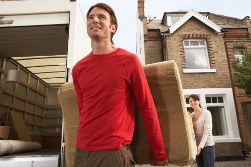 Careful handling of office desks and electronics during a move