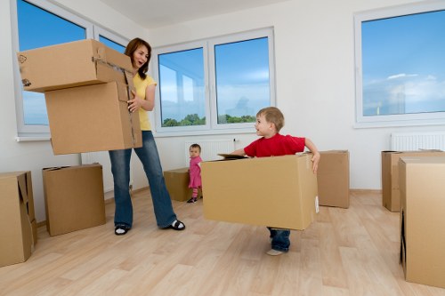Professional movers loading a van for a Northolt house move