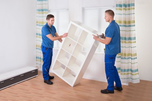 Furniture and packed boxes illustrating cubic-yard rate estimates